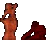 Two Cowering Clay Statues